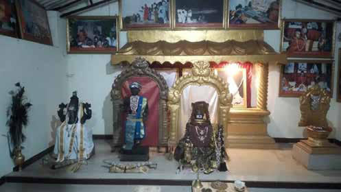 The deities of Ganesha, a Śiva Linga, and The SPH along with photos of Śri Ramakrishna, Sharada Devi, and Vivekananda 2